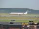 American Airlines jet start on it path down he runway departing Boston Logan Airport