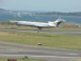 The wheels of a Delta jet are about to touch the runway in Boston at Logan Airport 