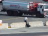 A crew member heads for a Business Express plane at Boston Logan Airport