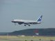 A United Airlines plane prepares to land at Logan Aitport in Boston