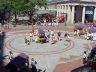 Vendors on the brick walkway at Quincy Market in Boston Massachusetts