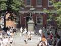 a statue of John Adams in front of Faneuil Hall in Boston Massachusetts