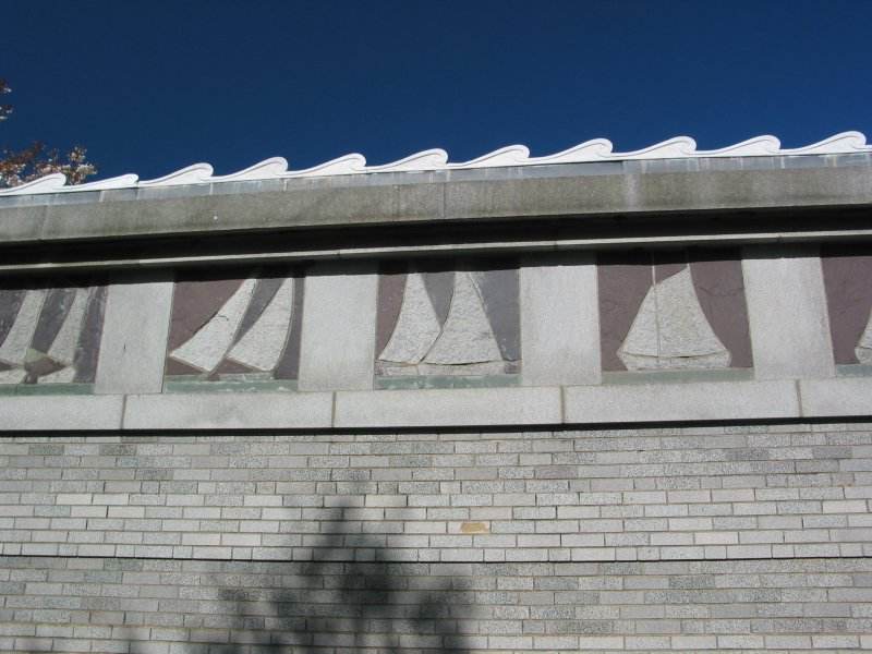 Stone boats on a Charles River boathouse