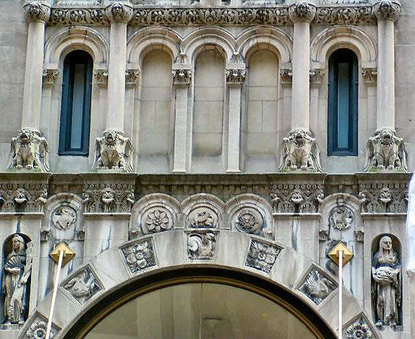 gargotyles decorate the front of a building