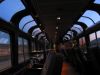 Inside a Superliner Lounge at night