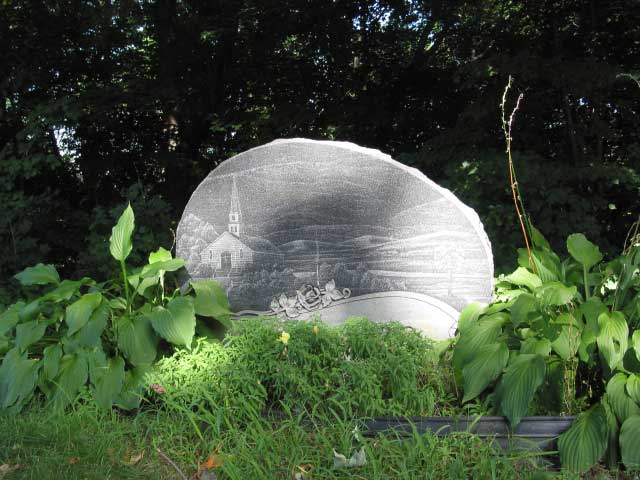 A headstone at the Edwards Church Cemetery in Saxonville