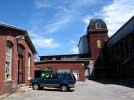 Buildings and a brick tower at the Saxonville Massachusetts  Mills